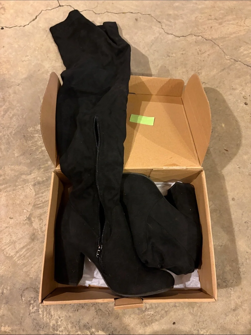 Thigh high black boots